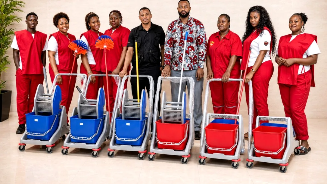AMAZONE team lined up behind cleaning trolleys